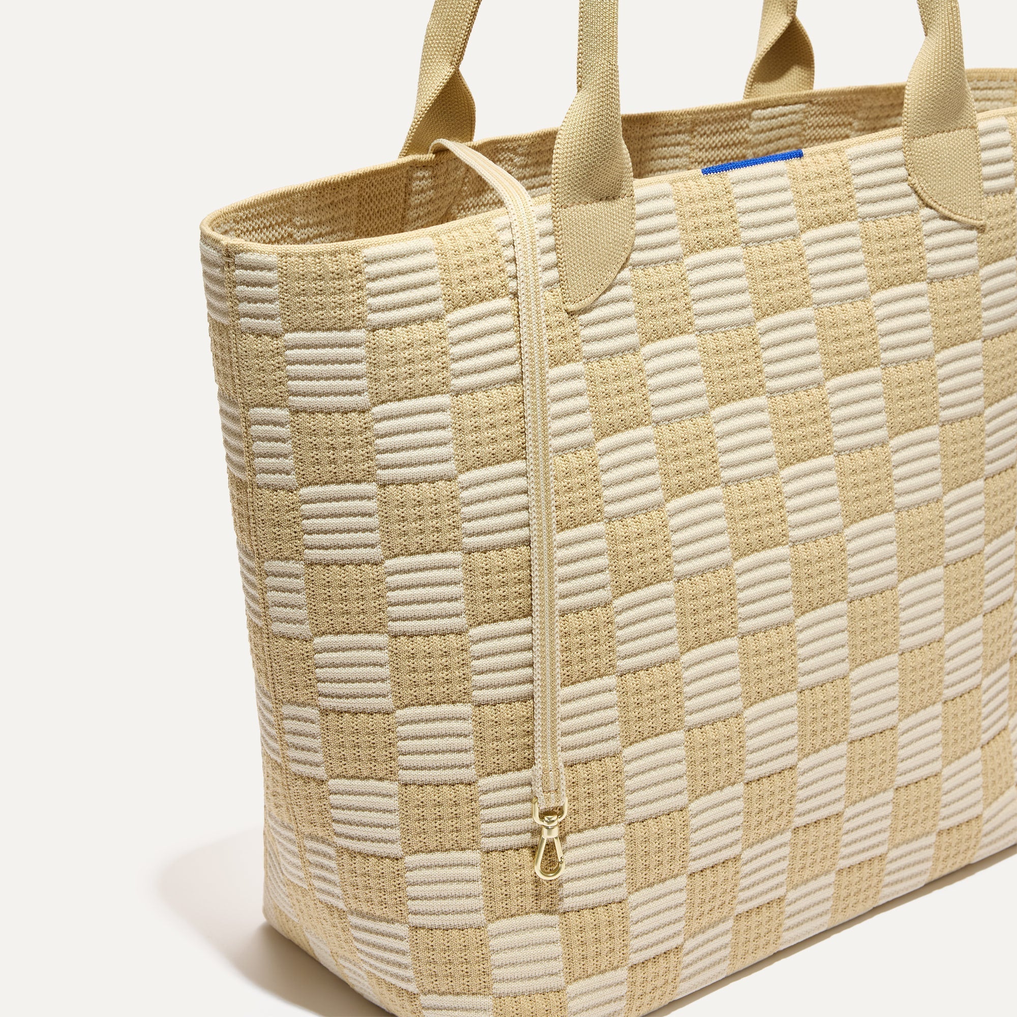 086_LightweightTote_CheckerSand_Front_Strap_4990.jpg