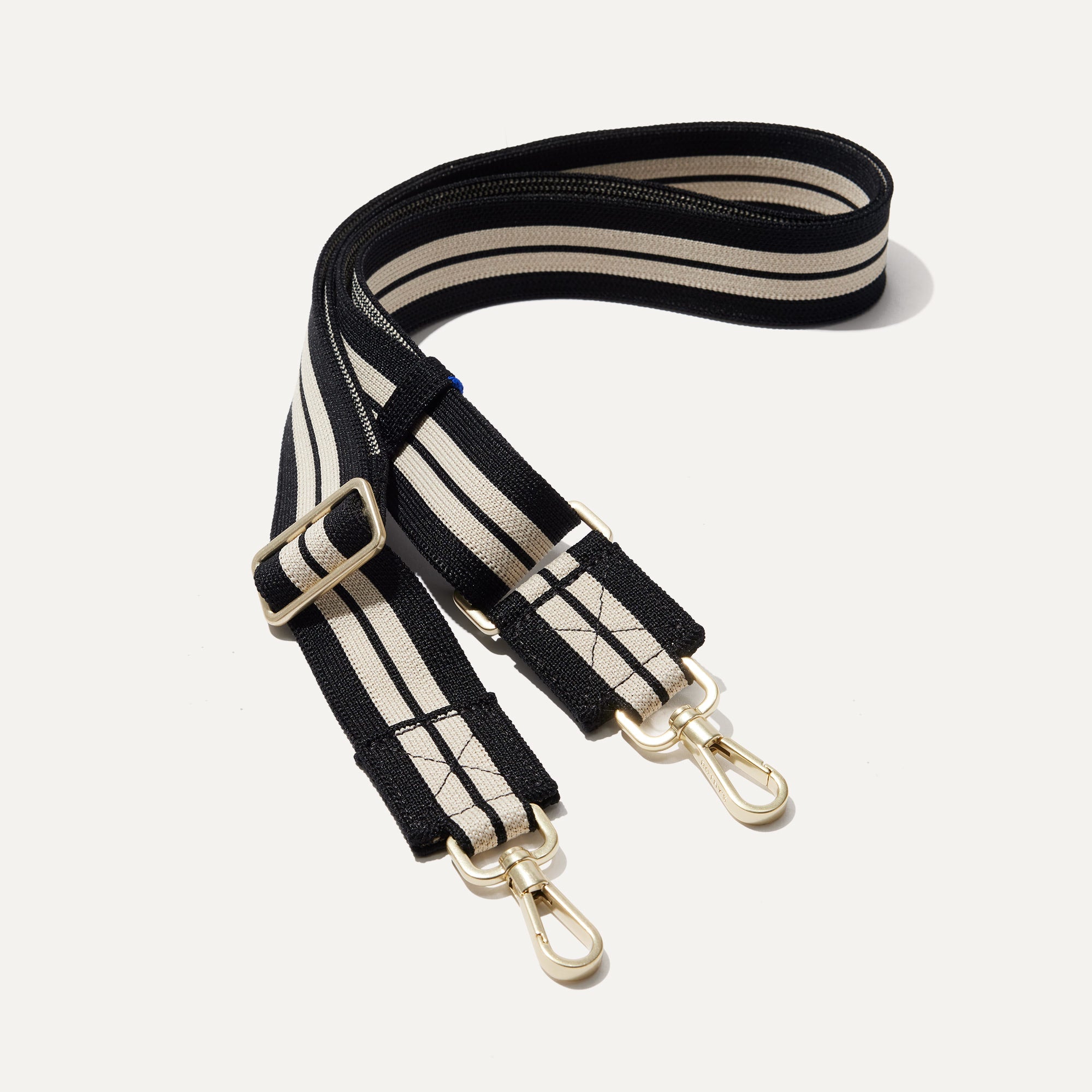 167_CrossbodyStrap_BlackandWhiteStripe_Front0847_b11e05f7-fd60-477d-9bf1-389a7c084028.jpg