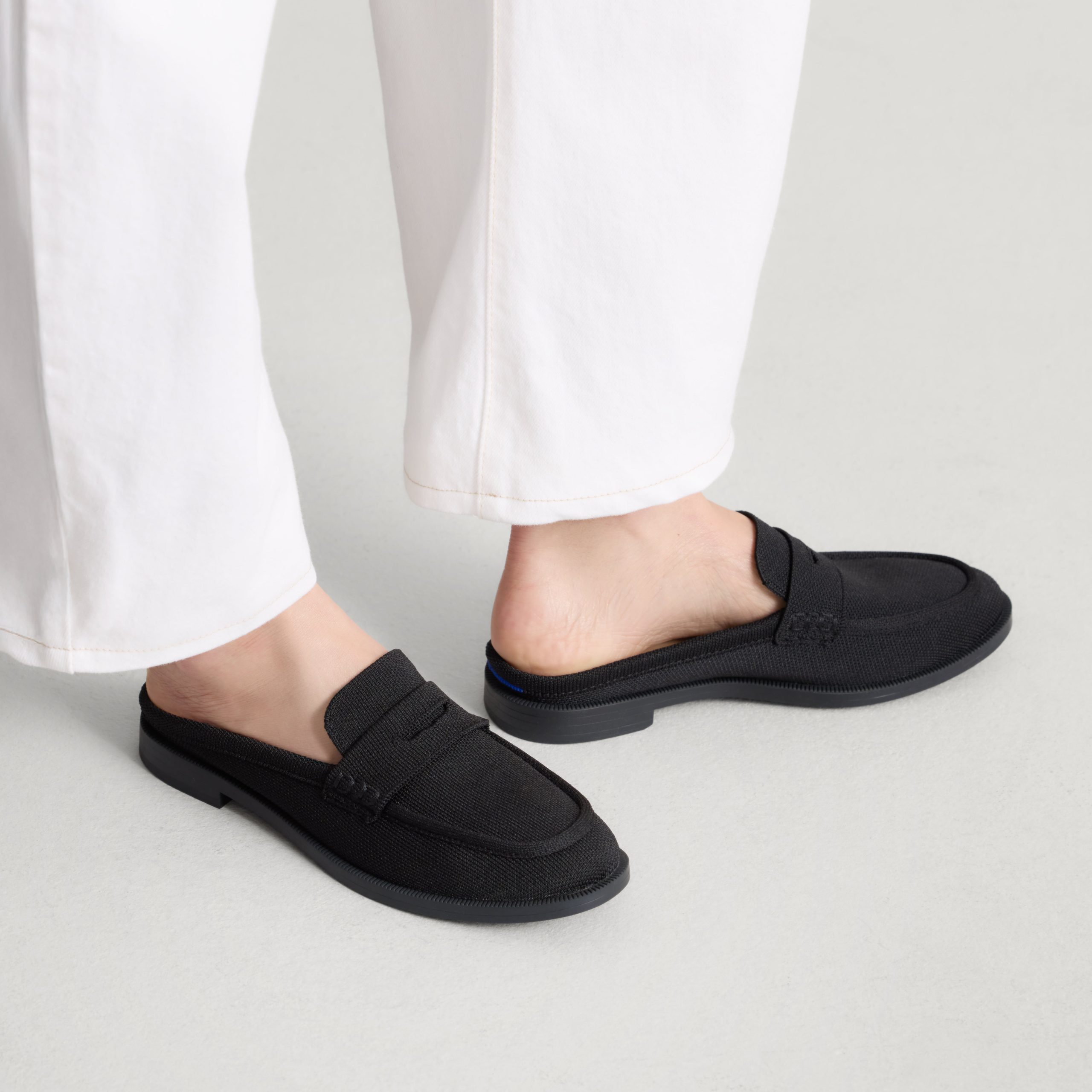 311_ReVelvetPennyLoaferMule_Black_OnFigure_2985.jpg