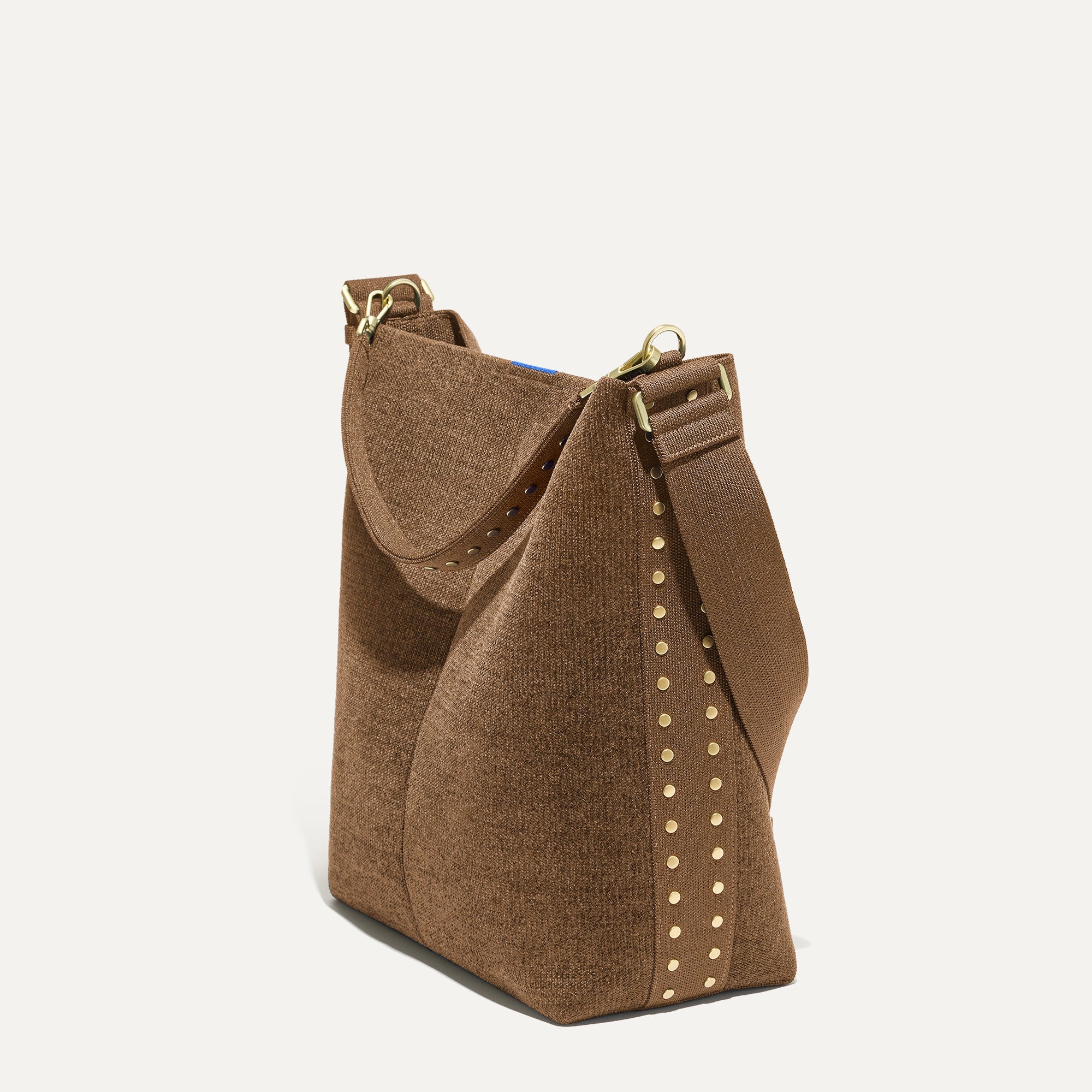 358_ReVelvet_Bucket_Bag_ReVelvet_Cinnamon_Studded_45_Degree_9365_fa077cc8-b823-4397-a417-180e9d2b69ae.jpg